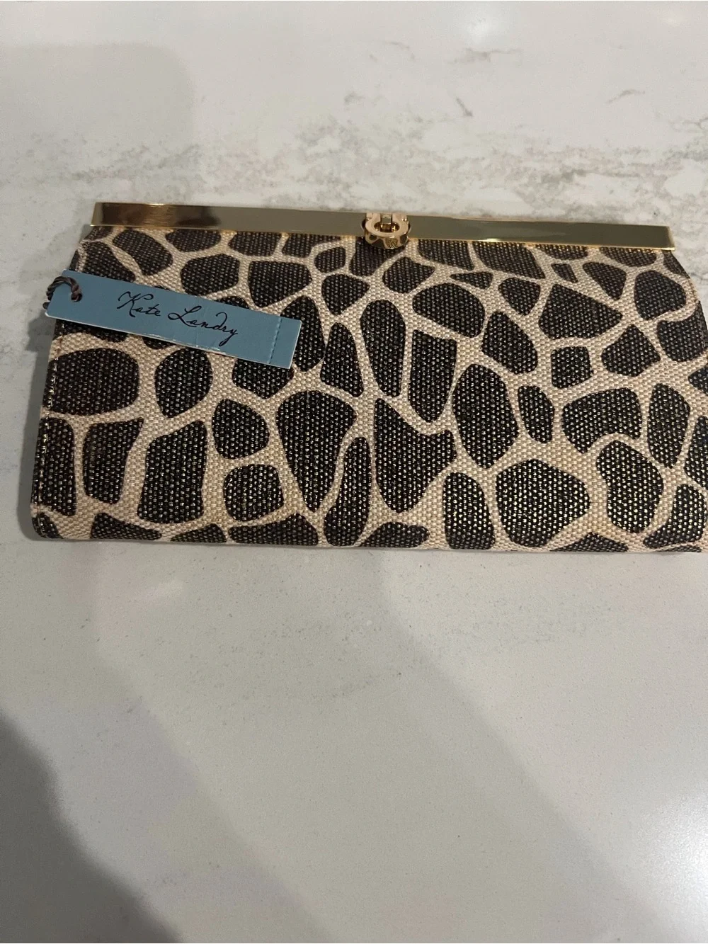 Kate Landry clutch background black